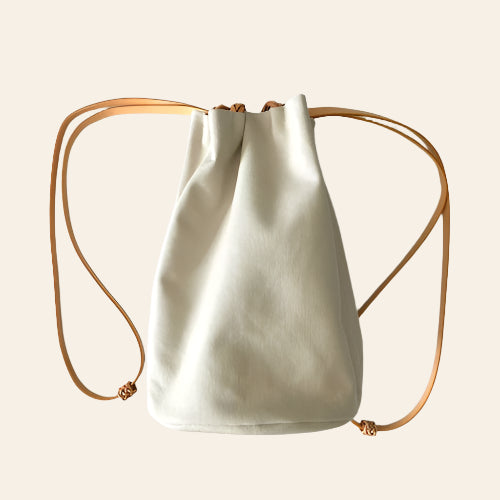KAMARO'AN Woven Drawstring Bucket Bag